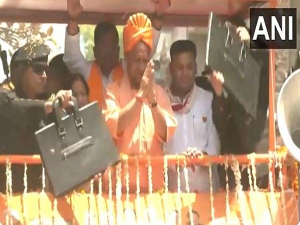 Yogi Adityanath conducts roadshow in UP's Mainpuri, claims SP-Congress will push India towards slavery